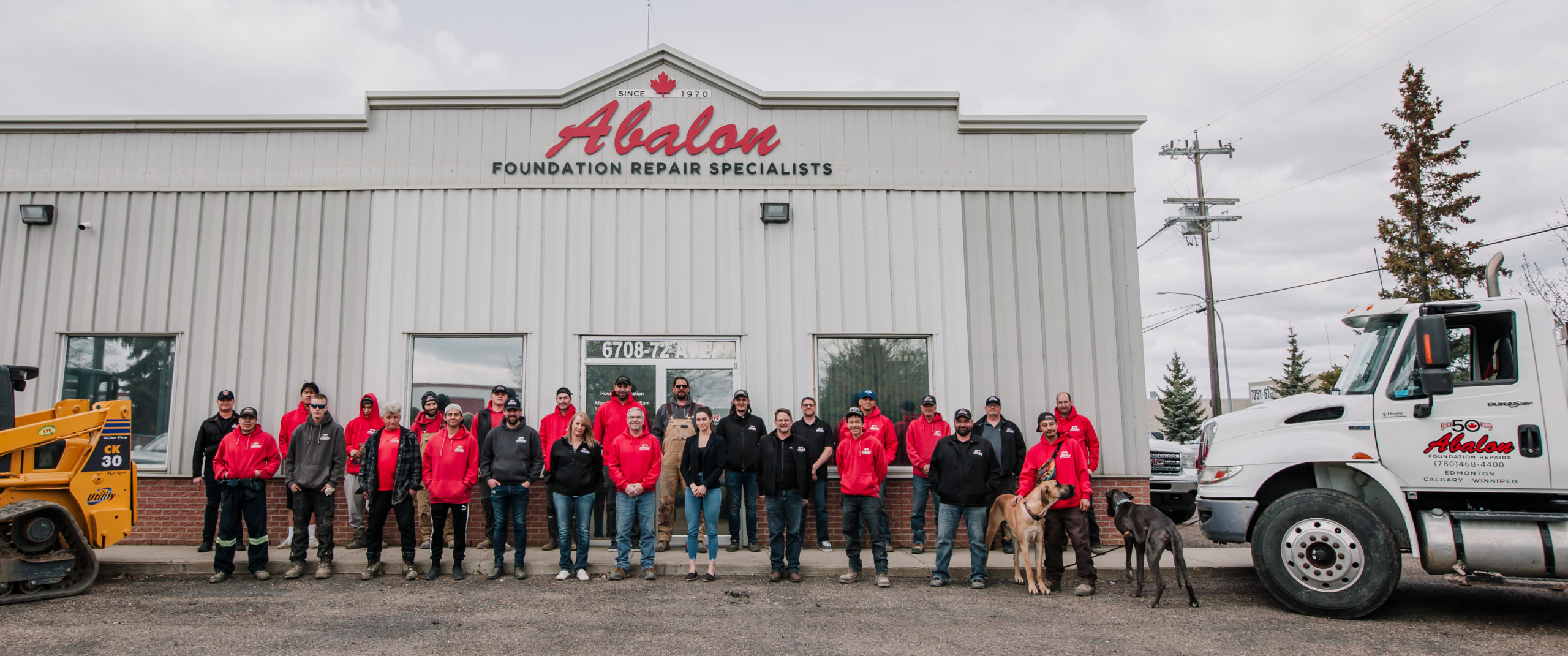 Abalon Construction  - Edmonton foundation repair experts - photo of team in front entrance